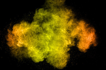 color powder explosion on black background. Mauve color cloud. color dust explode. Freeze motion paint Holi.