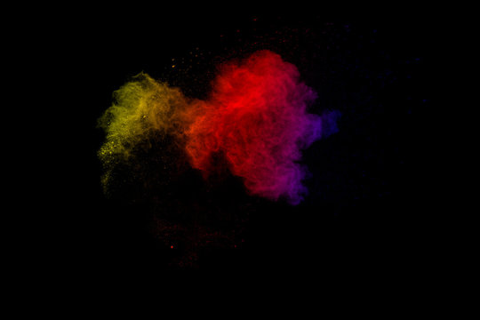 color powder explosion on black background.