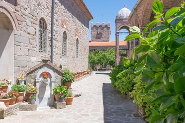 Fototapeta na wymiar The courtyard of the famous Moni Agiou Ioanni monastery Theotokou Ipsilou on the Greek island of Lesbos in the Aegean Sea.