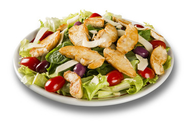 Fresh salad with chicken breast, arugula, olive and tomato. Healthy eating.