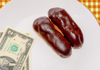 homemade chocolate brownies on white and orange  background.