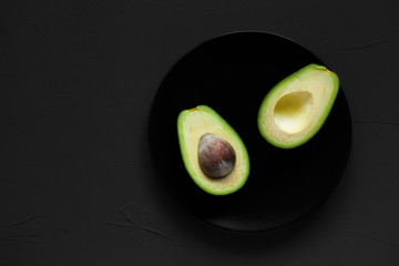 avocado halves on a plate