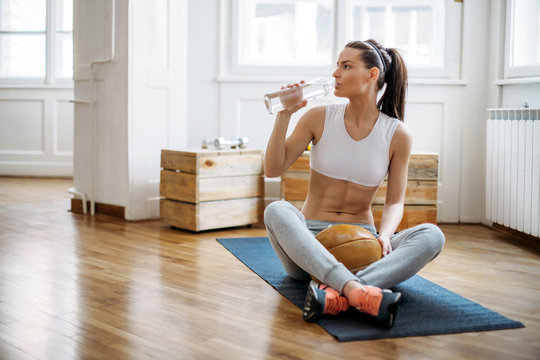 Woman resting during exercise