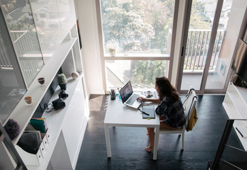 Young designer working from home