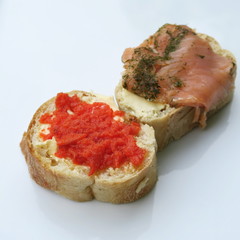 White bread stuffed with butter and smoked salmon isolated healthy food
