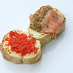 White bread stuffed with butter and smoked salmon isolated healthy food