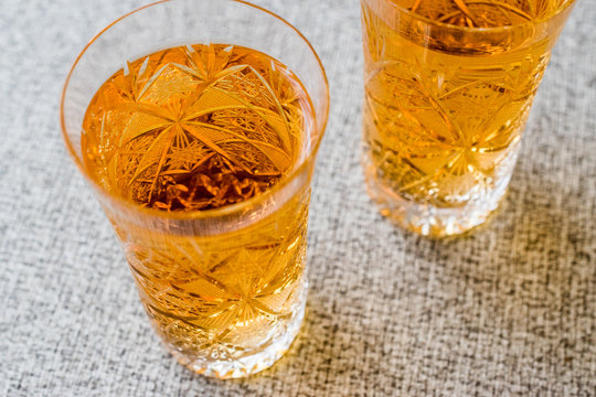 Safran or Koruk serbeti / Saffron Sherbet on grey surface..