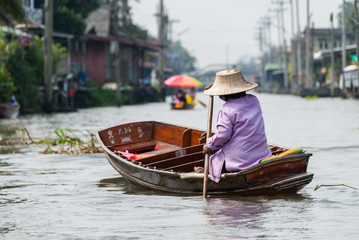 Fototapeta premium Woman at floating market