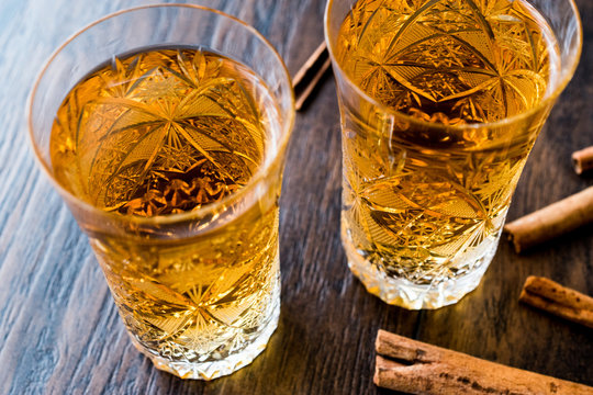 Safran or Koruk serbeti / Saffron Sherbet with cinnamon sticks.