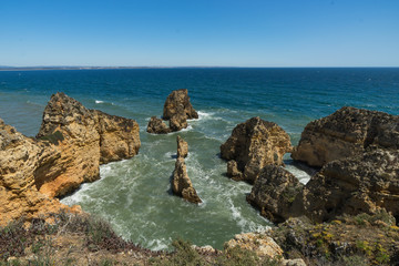 Fototapeta na wymiar Beautiful rocks and waves on the seashore of the Atlantic Ocean
