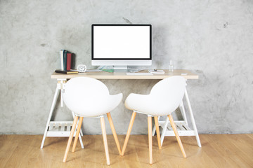 Contemporary office with empty computer monitor