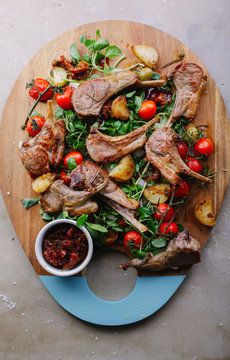 Lamb salad Roasted lamb chop salad with potato and roasted vine tomatoes