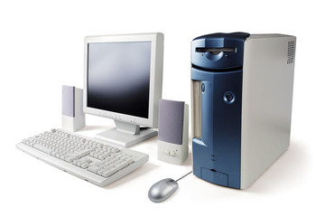 Computer, display, keyboard, mouse and loudspeakers on white background isolated