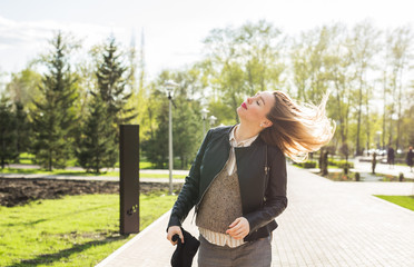 Stylish pregnancy concept. Portrait of happy pregnant woman in trendy clothing. Casual style.