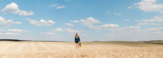woman missing on the fields with sunflowers