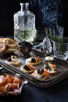 Blinis with smoked salmon,cream cheese and caviar