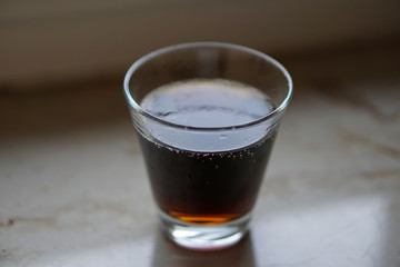 a glass with cola