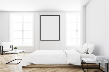 Naklejka na ściany i meble View of a bedroom with poster
