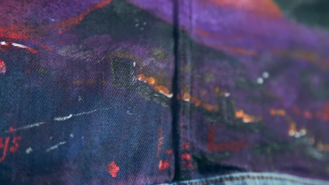 Modern drawing is on denim. The finished product of the artist: jeans jacket with the author's drawing. Author's work. Drawing on the fabric: signature of author of the picture, facsimile