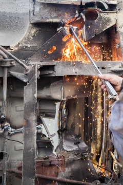 Cutting metal construction with cutting torch
