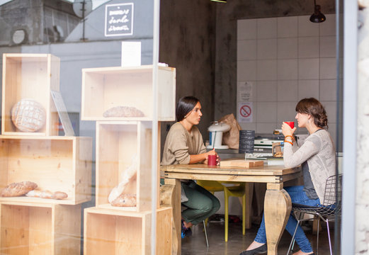 Friends Drinking Coffee in a Bakery