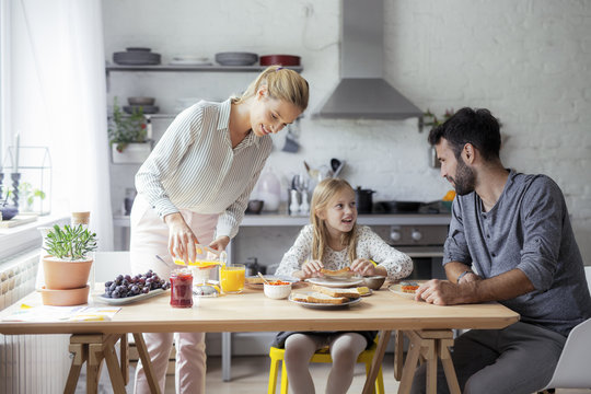 Family Having Breakfast Together
