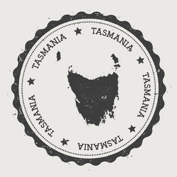 Tasmania sticker. Hipster round rubber stamp with island map. Vintage passport sign with circular text and stars, vector illustration.