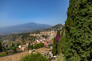 Fototapeta na wymiar Aerial view of Taormina city and Mount Etna Volcano - Taormina, Sicily, Italy