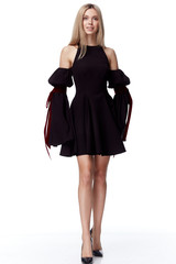 Sexy pretty fashion model blond hair woman wear style for party office clothes organic natural black short dress white background makeup lady beautiful face luxury lifestyle .