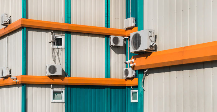 Building facade with blue and orange elements