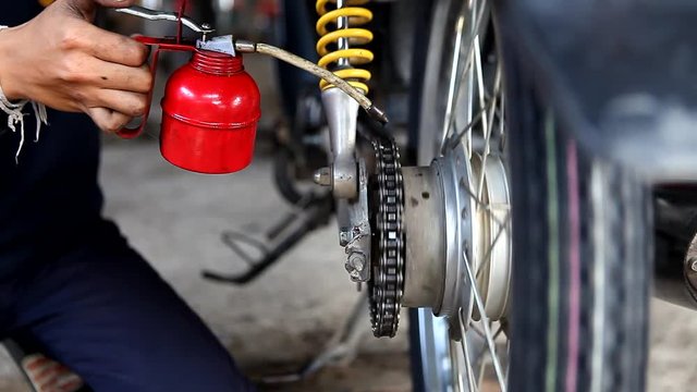 Motorcycle chain lubrication. 