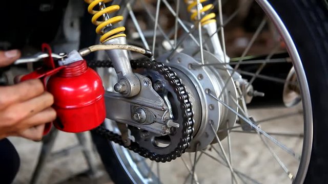 Motorcycle chain lubrication. 