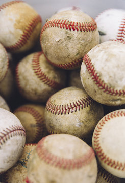 Bucket filled with baseballs