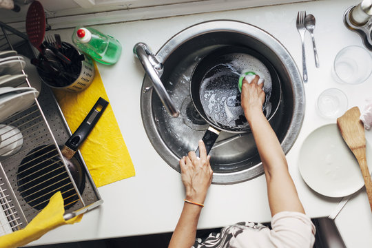 Woman washing dishes