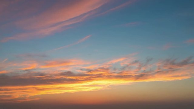 time lapse of sunset glow in the summer