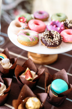 Close-up of donuts on cake stand