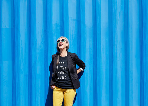 Portrait Of Stylish Senior Woman Laughing