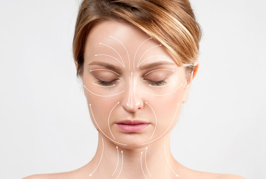 Skin Care. Woman with perfectly clean skin and massage facial lines