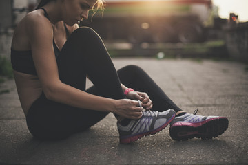 Sportswoman Tying Shoelaces