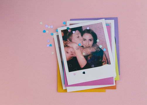 Photo of best friends on a pink background with heart confetti