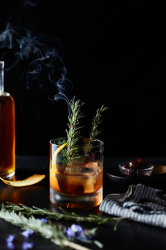 Maple Old Fashion Cocktail Drink with Smoking Rosemary 
