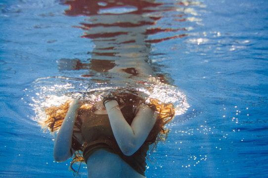 Underwater shot of woman swimming 