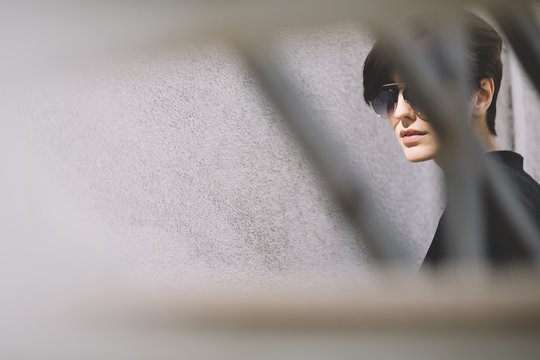 portrait of real young woman with sunglasses