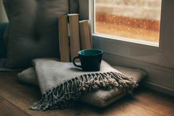 Coffee time in a cozy home on a rainy day