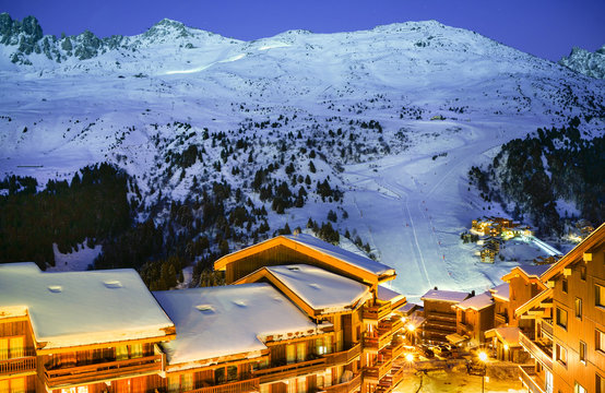 Sunset view of ski resort Meribel - Mottaret in French Alps 