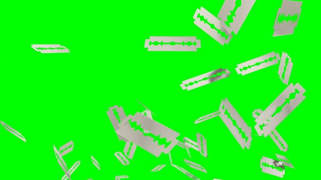 Animated light rain of plain razor blades against green background. High angle shot.