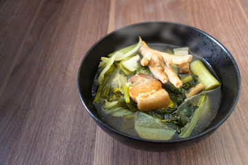 cooking soup chinese vegetable stew have streaky pork and Chicken legs