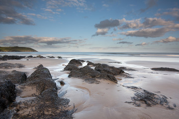 Rocks on the Beach with rock pools at low tide
