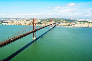 Fototapeta na wymiar View of 25th April Bridge in Lisbon