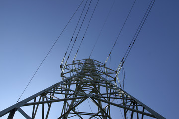  High-voltage power lines at sunrise